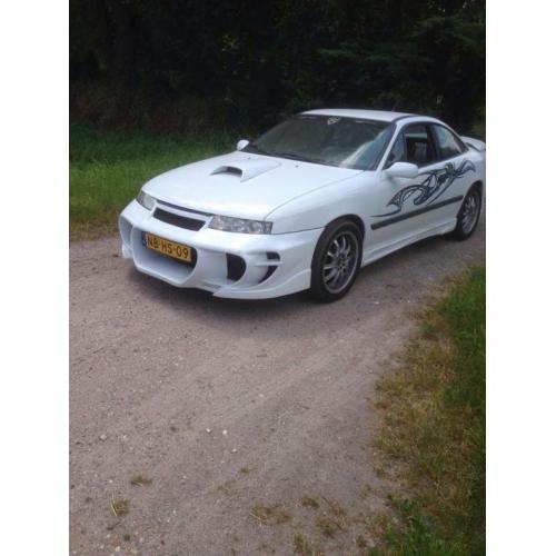 Opel Calibra 2.5 onderdelen alles wa je zoekt