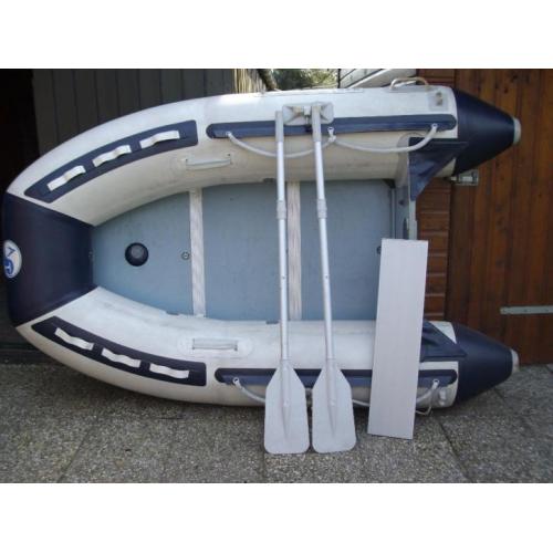 Te koop rubberboot en buitenboort moter