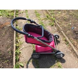 Mooie roze poppenwagen te koop