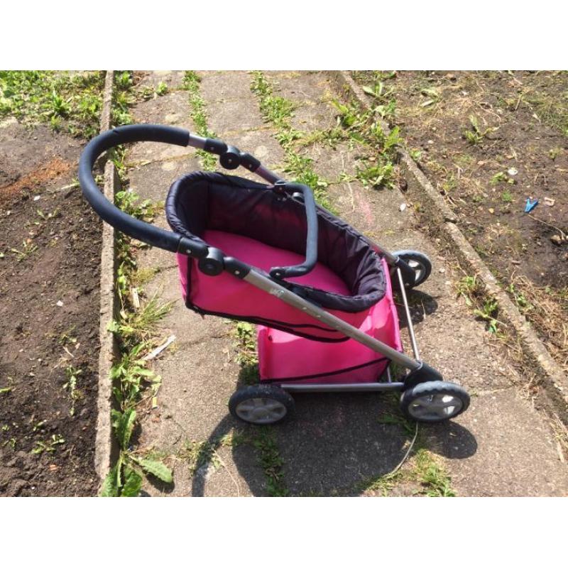 Mooie roze poppenwagen te koop