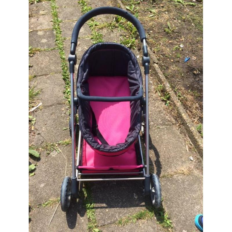 Mooie roze poppenwagen te koop