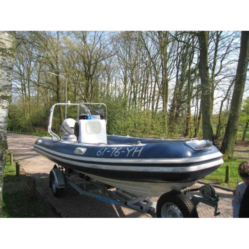 Dromor Rib met 90pk, optimist en aanhanger