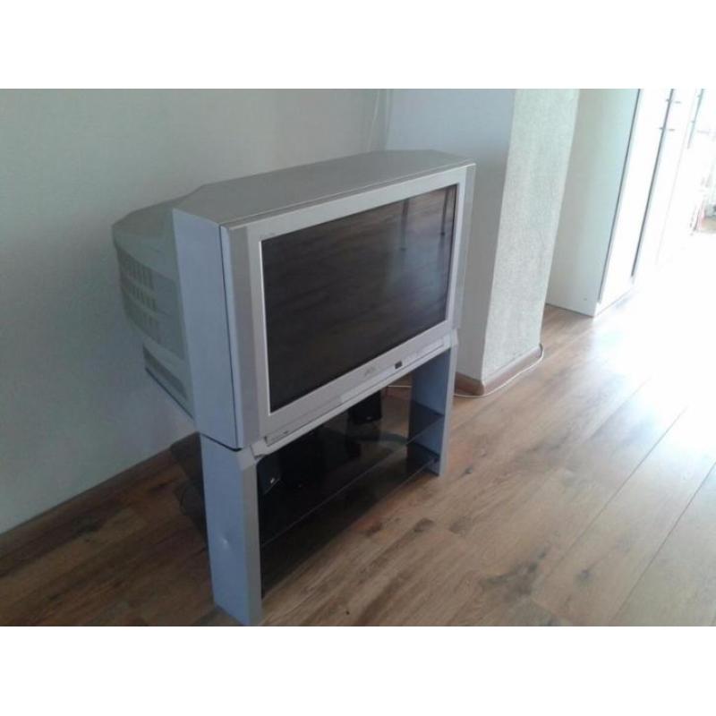 TV + Tv stand + Speakers Gratis