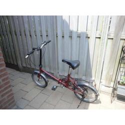 vouwfiets rood in gebruikte staat merk kyoso