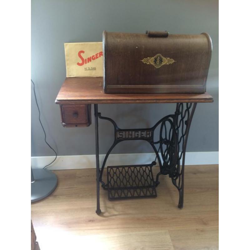 Oude singer naaimachine