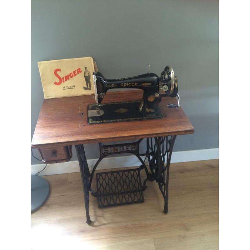 Oude singer naaimachine
