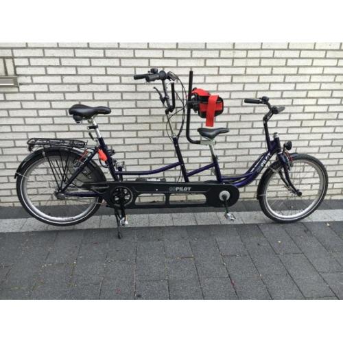 Tandem volwassene en kind