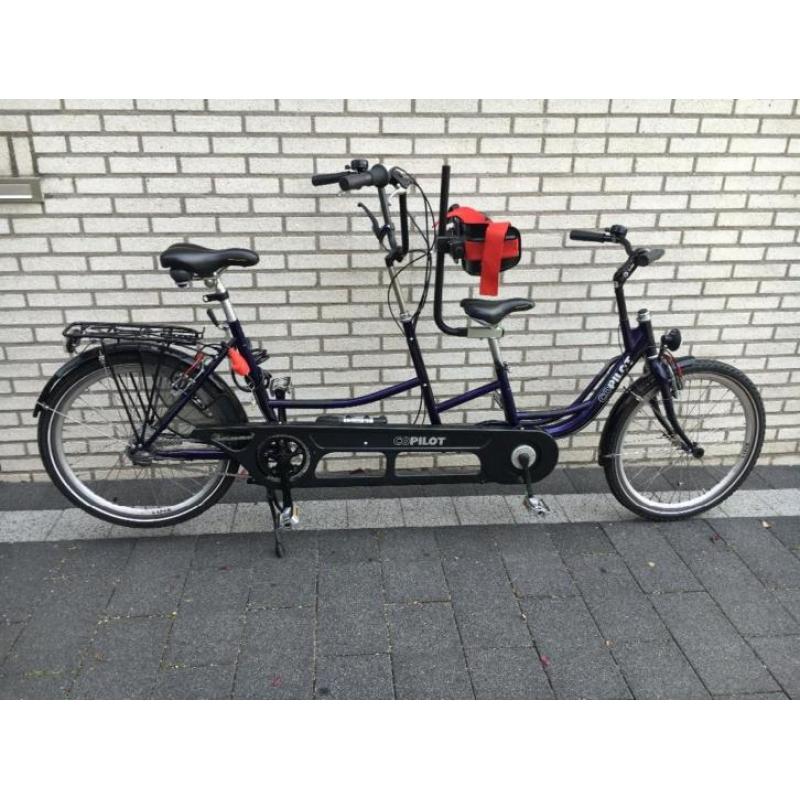 Tandem volwassene en kind