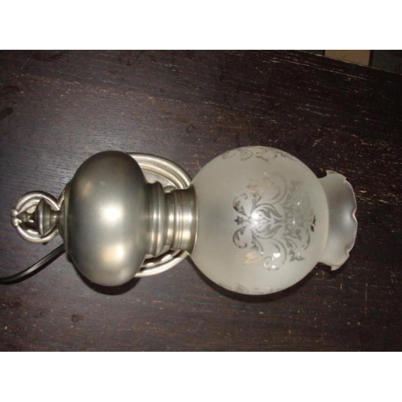 wandlamp van zuiver tin
