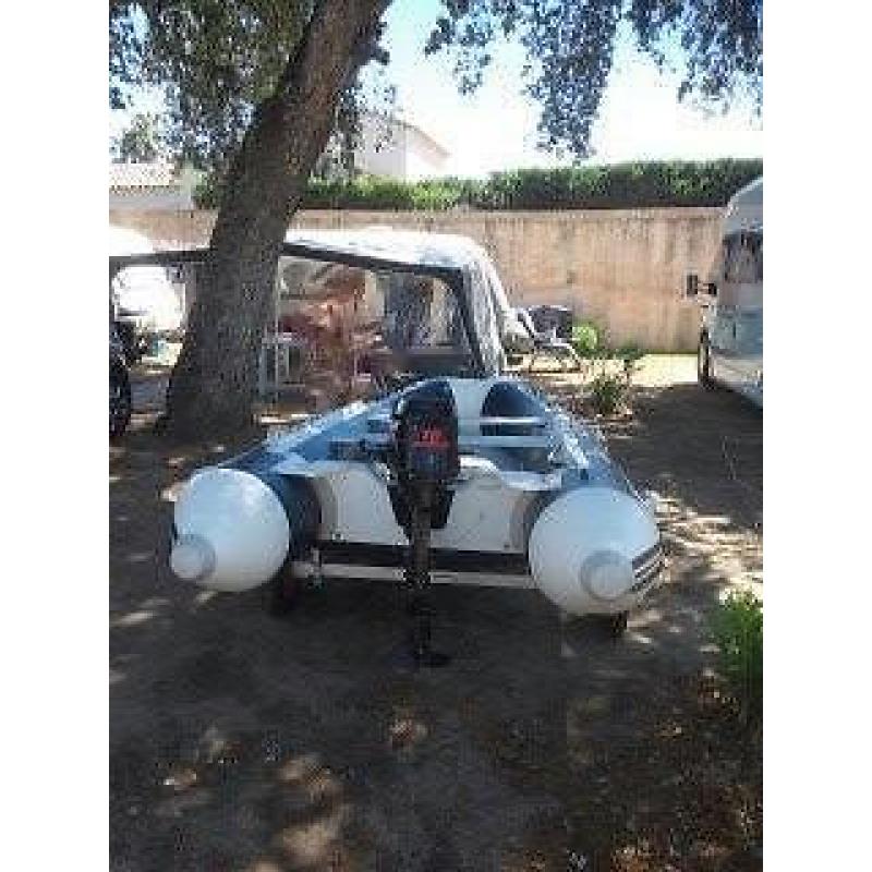 Rubberboot met motor en Kalff trailer