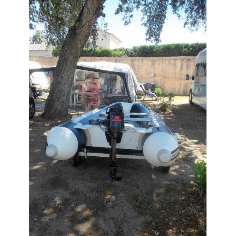 Rubberboot met motor en Kalff trailer