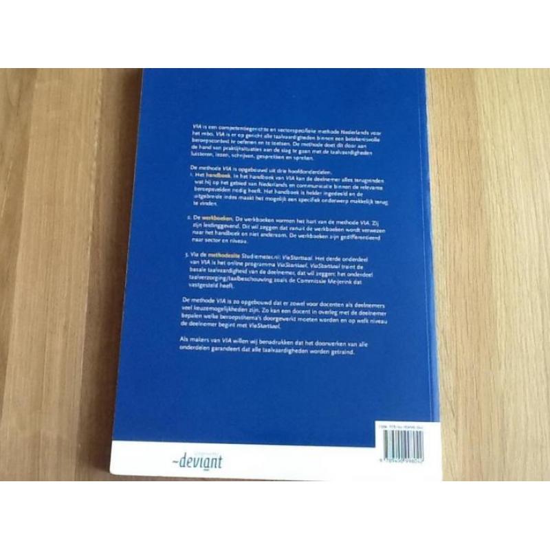 Via werkboek Nederlands