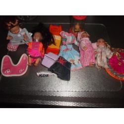 Leuke set van 4 Mini popjes/ extra kleding/bed/borstel