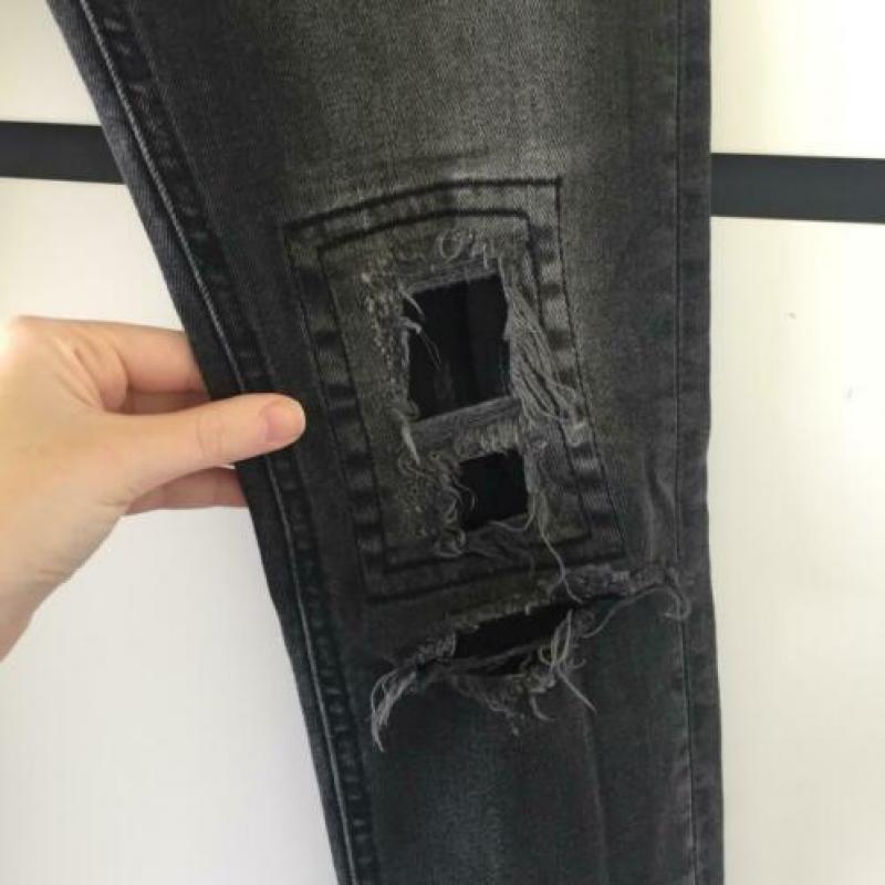 Skinny jeans met scheuren van de H&M in maat s