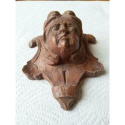 Twee houten engelen koppen