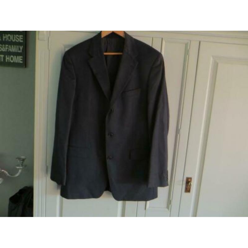Schitterend pak van het merk Hugo Boss maat 50/52.