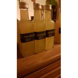home made limoncello en mineola likeur33% flesjes van 100ml