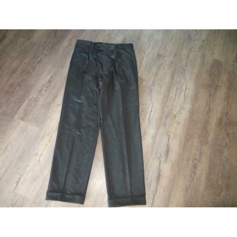 Schitterend pak van het merk Hugo Boss maat 50/52.