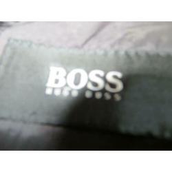 Schitterend pak van het merk Hugo Boss maat 50/52.