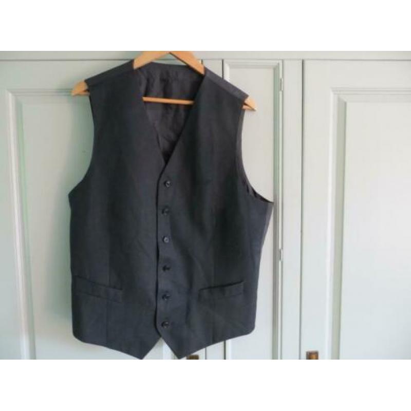 Schitterend pak van het merk Hugo Boss maat 50/52.