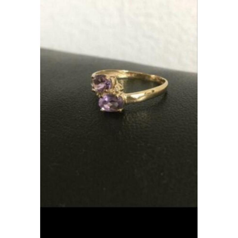 Mooie NIEUWE 9 krt gouden ring met 2 facet geslepen amethist