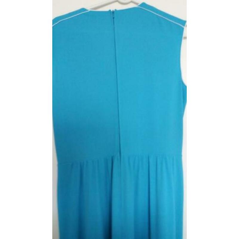 Schattige zomer jurk in licht petro blauw. Maat 44