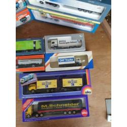 Veel Tekno en Lion Car vrachtauto's te koop. Per stuk. 1:50