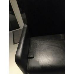 Luxe zwarte leren eetkamerstoelen op wieltjes