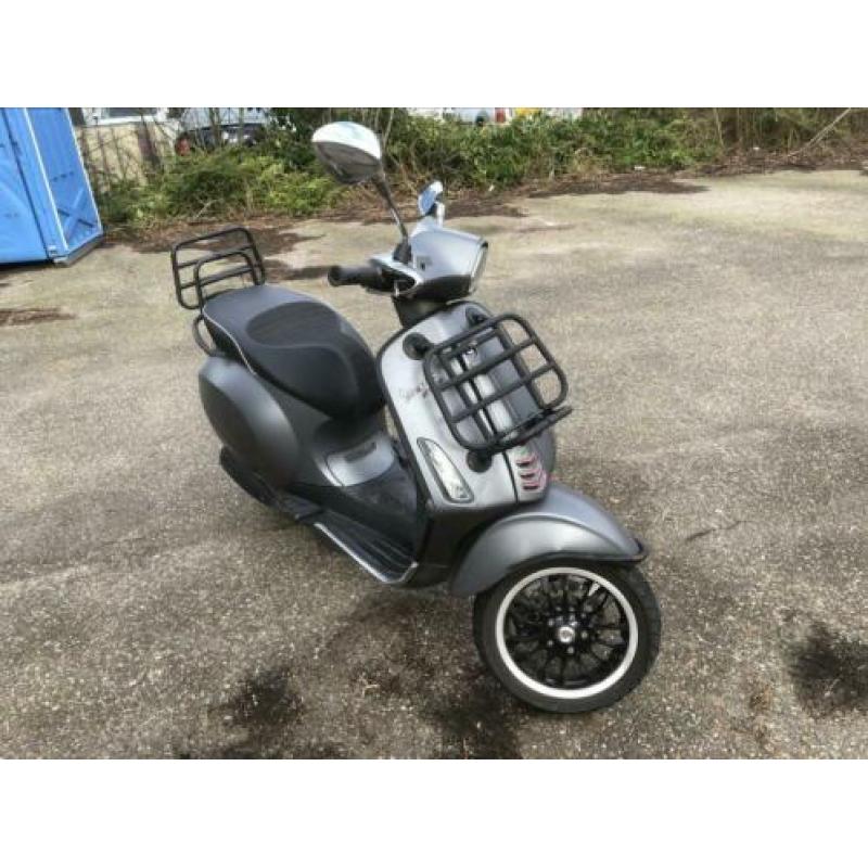 Vespa sprint Voorrekje + Achterrekje