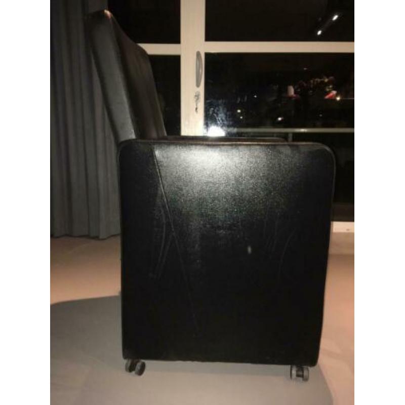 Luxe zwarte leren eetkamerstoelen op wieltjes