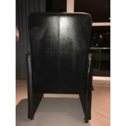 Luxe zwarte leren eetkamerstoelen op wieltjes