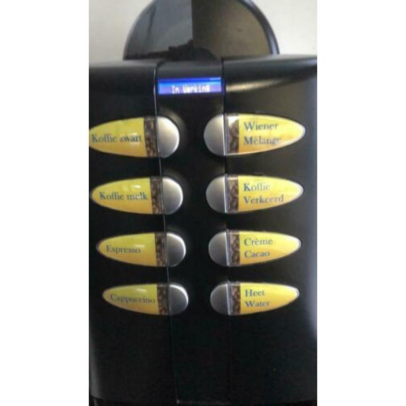 Koffiemachine met muntinworp