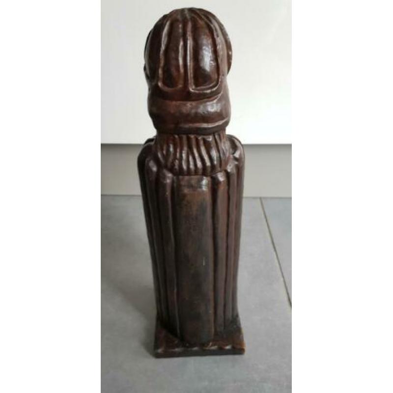 Leuk houten beeldje om een fles drank in op te bergen