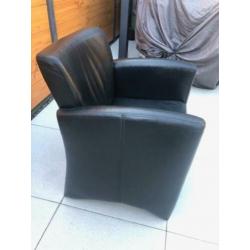 Zwarte lederen fauteuils