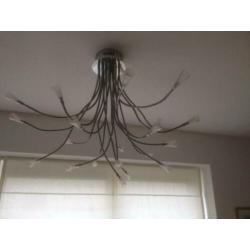 Hanglamp met verstelbare armen super gaaf! Kijken in Baarn!