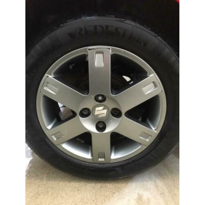 Suzuki swift 4x100 banden 15 inch