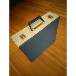 Vintage platenkoffer met verleden