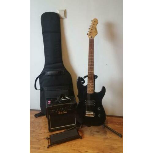 Zwarte electrische Encore gitaar. Beginnersset.