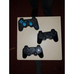 Ps 3 met veel spellen 3controllers en een headset