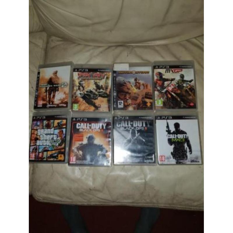 Ps 3 met veel spellen 3controllers en een headset